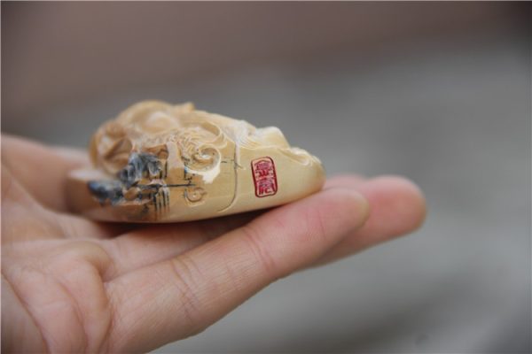 金亮大师猛犸象牙咖啡关公牌子 - 图片 2